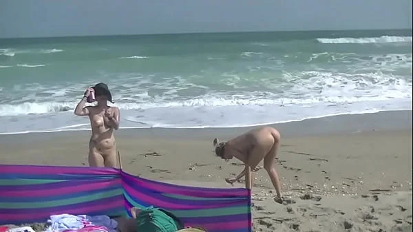 Exhibitionist Wife 484 Part 5 - Mrs Ginary and Mrs Nikki Brooks Teasing Nude Beach Voyeur!  Spreading legs and teasing cocks in public!